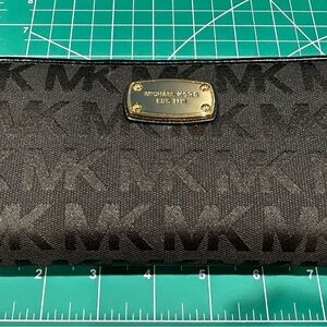 Jet Set Travel Large Signature Logo Continental Wallet
